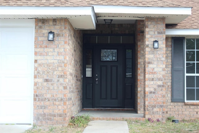 entrance to property with a garage