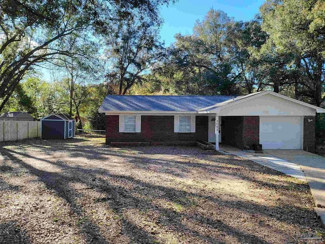 single story home featuring a garage and a storage unit