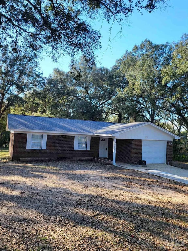 single story home with a garage