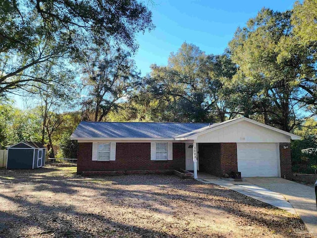 ranch-style house featuring a garage and a shed