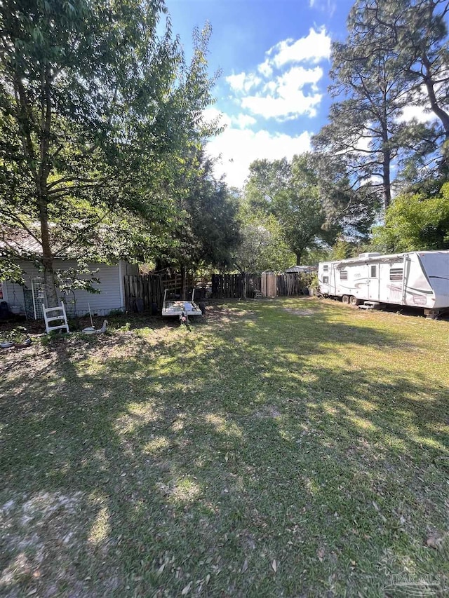 view of yard featuring fence