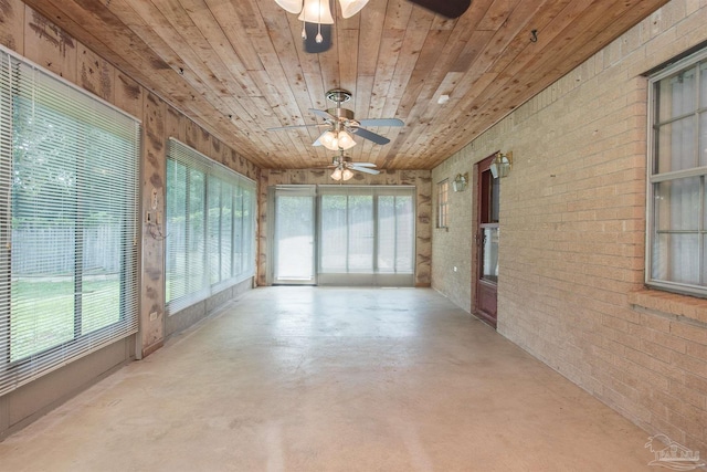 unfurnished sunroom featuring wooden ceiling