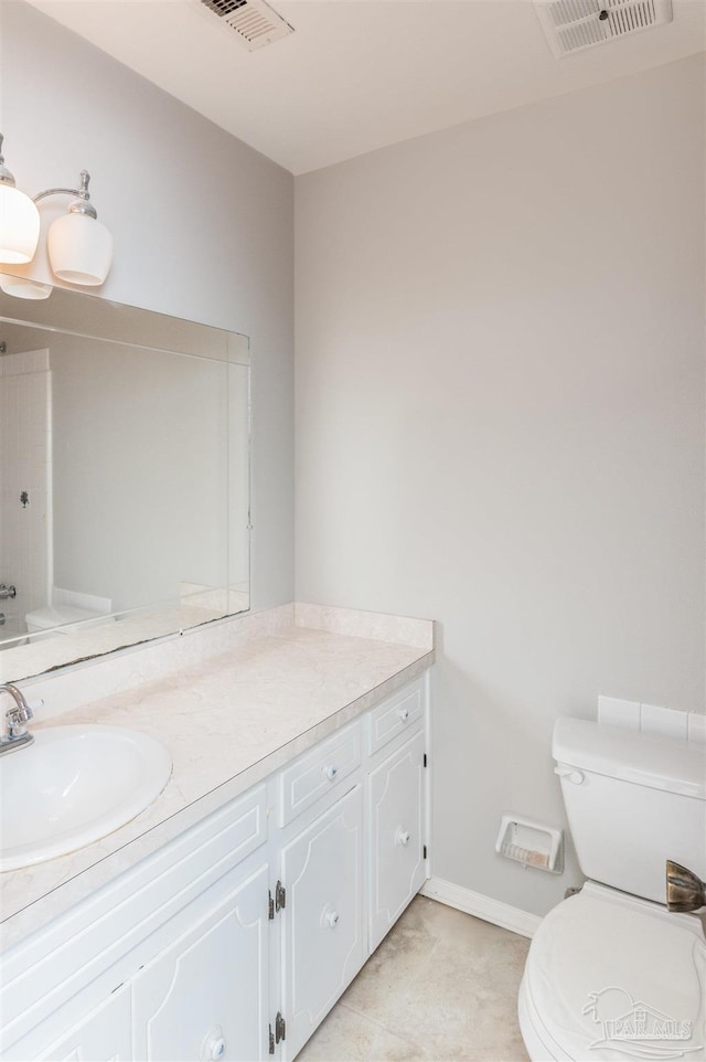 full bathroom featuring vanity, tile patterned floors, shower / bathtub combination, and toilet