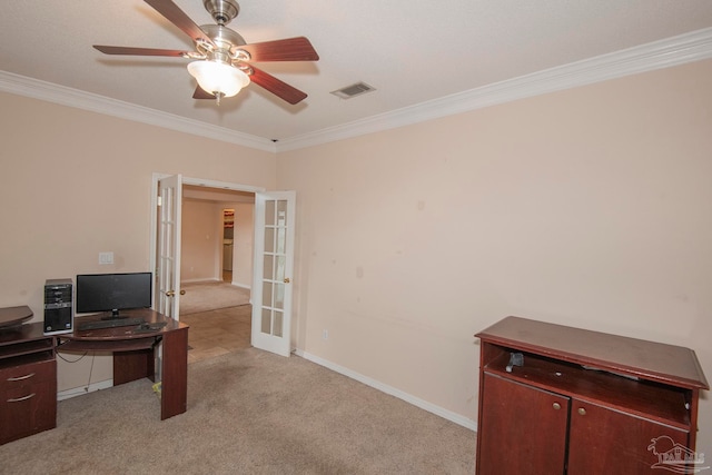 carpeted office space with french doors, ceiling fan, and ornamental molding