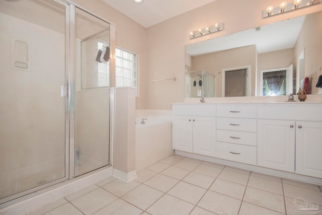 bathroom with vanity, separate shower and tub, and tile patterned flooring