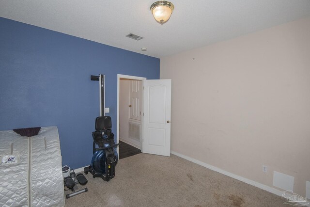 unfurnished bedroom with carpet flooring