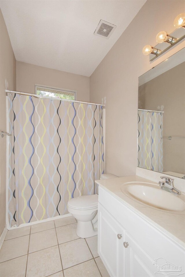 bathroom with hardwood / wood-style floors and an enclosed shower