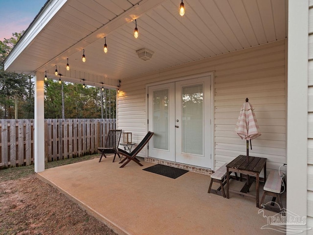 view of patio terrace at dusk