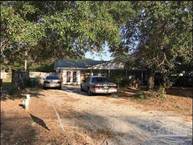 1790 Abercrombie Rd, Gulf Breeze, FL 32563 - ranch-style home featuring fence and french doors