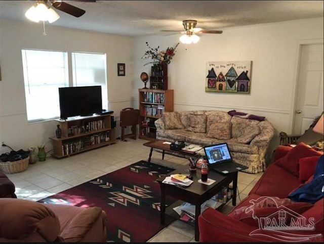 1790 Abercrombie Rd, Gulf Breeze, FL 32563 - living room featuring ceiling fan and tile patterned floors