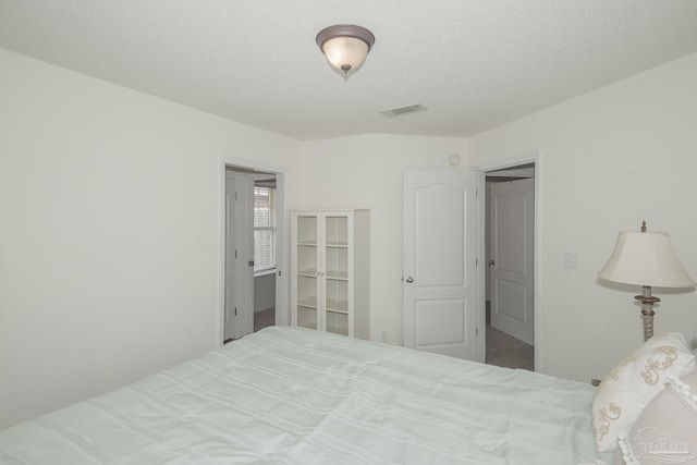 bedroom with a textured ceiling