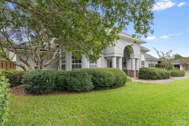 view of front of home with a front lawn