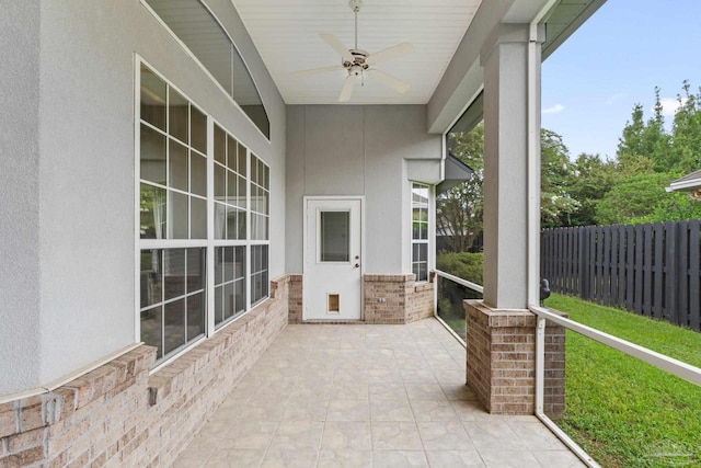 view of patio / terrace featuring ceiling fan