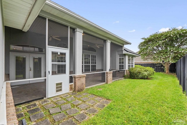 exterior space featuring ceiling fan and a patio area