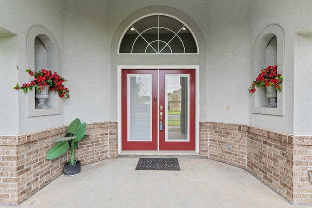 doorway to property featuring french doors