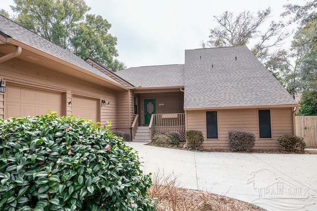 single story home featuring a garage