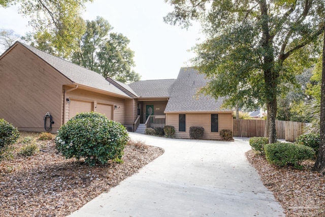 ranch-style home with a garage