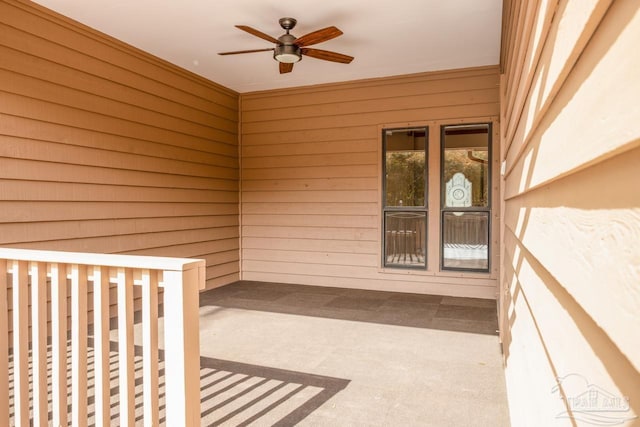 property entrance featuring ceiling fan