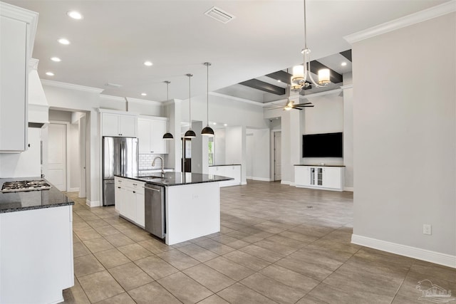 5936 Huntington Creek Blvd, Pensacola, FL 32526 - kitchen with ornamental molding, appliances with stainless steel finishes, recessed lighting, white cabinets, and a center island with sink
