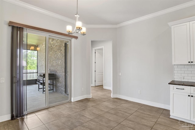 5936 Huntington Creek Blvd, Pensacola, FL 32526 - dining room with a chandelier, crown molding, and light tile patterned flooring