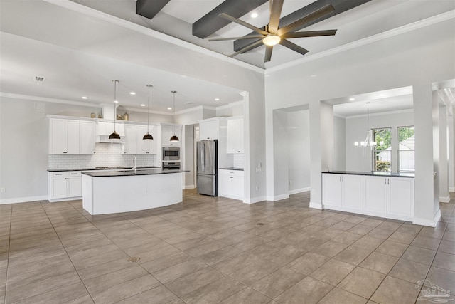 5936 Huntington Creek Blvd, Pensacola, FL 32526 - kitchen featuring stainless steel appliances, dark countertops, decorative backsplash, open floor plan, and a chandelier