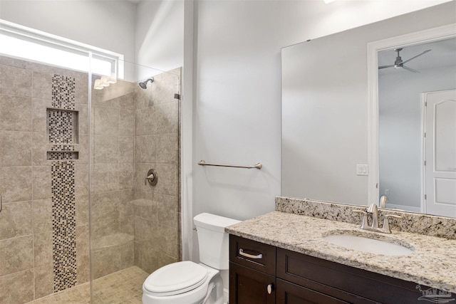 5936 Huntington Creek Blvd, Pensacola, FL 32526 - bathroom with vanity, a tile shower, and ceiling fan