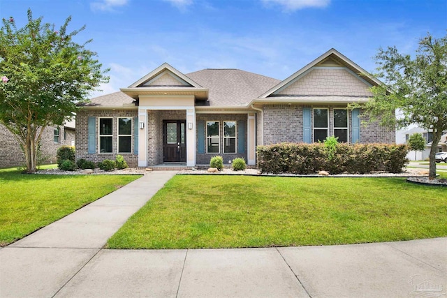 5936 Huntington Creek Blvd, Pensacola, FL 32526 - view of front of home featuring brick siding and a front yard