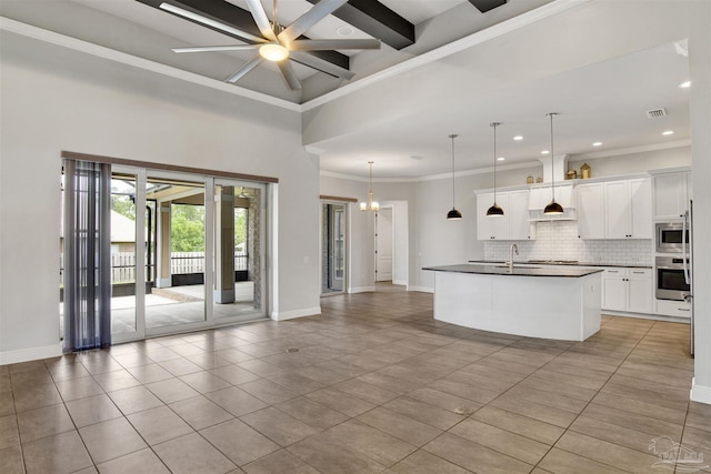 5936 Huntington Creek Blvd, Pensacola, FL 32526 - kitchen with stainless steel appliances, backsplash, open floor plan, light tile patterned floors, and dark countertops