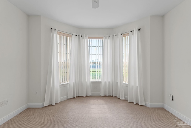 2006 Costa Verde Ct, Navarre, FL 32566 - empty room with carpet flooring, baseboards, and ceiling fan