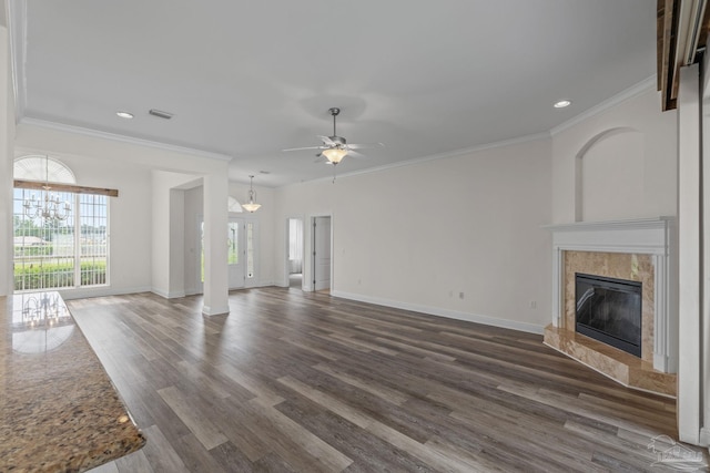 2006 Costa Verde Ct, Navarre, FL 32566 - unfurnished living room featuring a fireplace, baseboards, dark wood-style floors, a chandelier, and recessed lighting