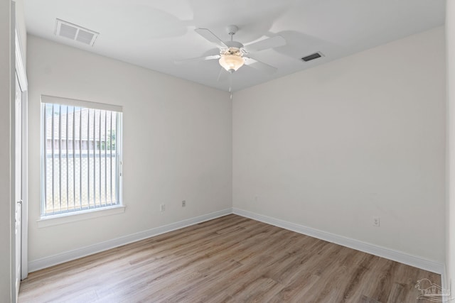 2006 Costa Verde Ct, Navarre, FL 32566 - unfurnished room featuring light wood-style flooring, baseboards, and ceiling fan