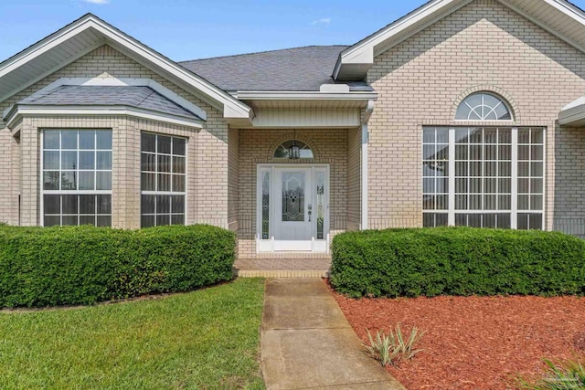 2006 Costa Verde Ct, Navarre, FL 32566 - doorway to property featuring brick siding