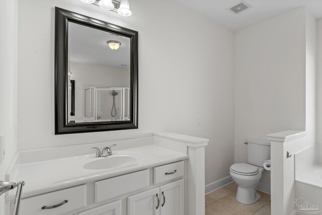 2006 Costa Verde Ct, Navarre, FL 32566 - full bathroom with vanity, tile patterned floors, toilet, a shower with shower door, and a bath