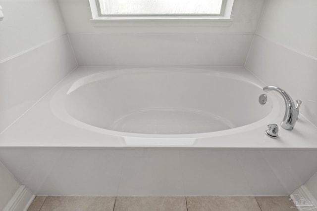 2006 Costa Verde Ct, Navarre, FL 32566 - full bathroom with plenty of natural light, a garden tub, and tile patterned flooring