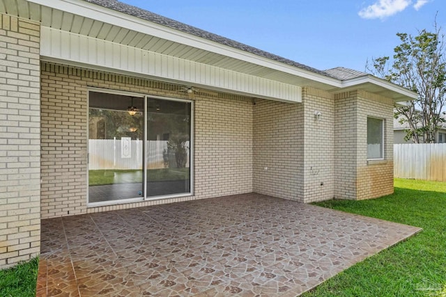 2006 Costa Verde Ct, Navarre, FL 32566 - exterior space with a patio area and brick siding