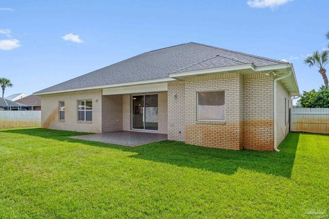 2006 Costa Verde Ct, Navarre, FL 32566 - rear view of house with a patio, brick siding, and roof with shingles