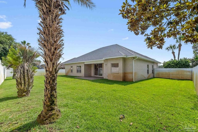 2006 Costa Verde Ct, Navarre, FL 32566 - rear view of property with a patio and brick siding