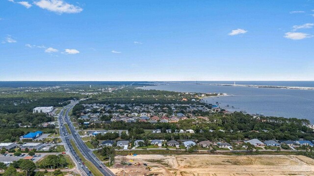 2006 Costa Verde Ct, Navarre, FL 32566 - aerial overview of property's location featuring a nearby body of water, a main thoroughfare, and nearby suburban area