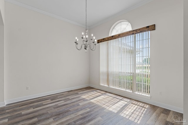 2006 Costa Verde Ct, Navarre, FL 32566 - spare room with wood finished floors, a chandelier, baseboards, and ornamental molding