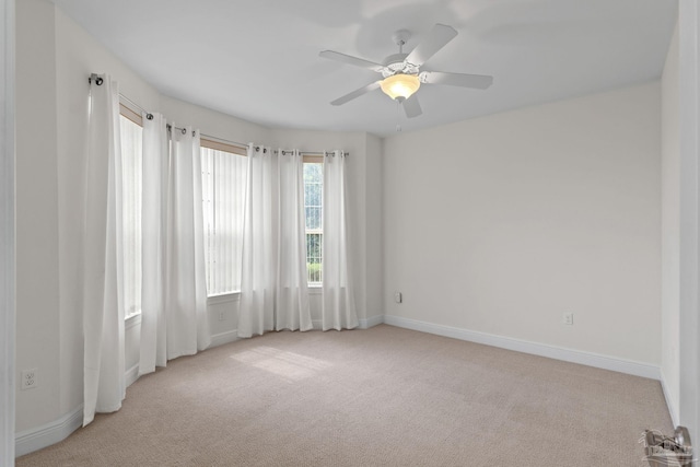 2006 Costa Verde Ct, Navarre, FL 32566 - empty room with light colored carpet, baseboards, and ceiling fan