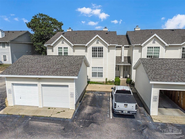 601 E Burgess Rd Unit J2, Pensacola, FL 32504 - view of front of house with a garage