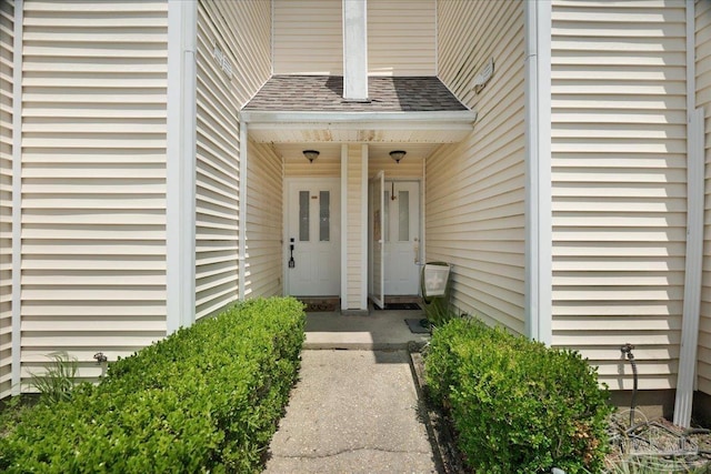 601 E Burgess Rd Unit J2, Pensacola, FL 32504 - doorway to property featuring a shingled roof