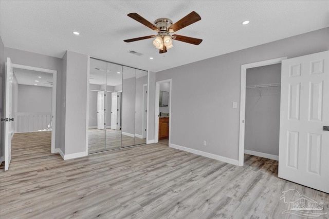 601 E Burgess Rd Unit J2, Pensacola, FL 32504 - unfurnished bedroom with light wood-type flooring, connected bathroom, baseboards, recessed lighting, and ceiling fan