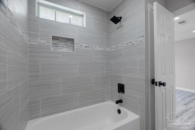 601 E Burgess Rd Unit J2, Pensacola, FL 32504 - full bathroom featuring shower / washtub combination and baseboards