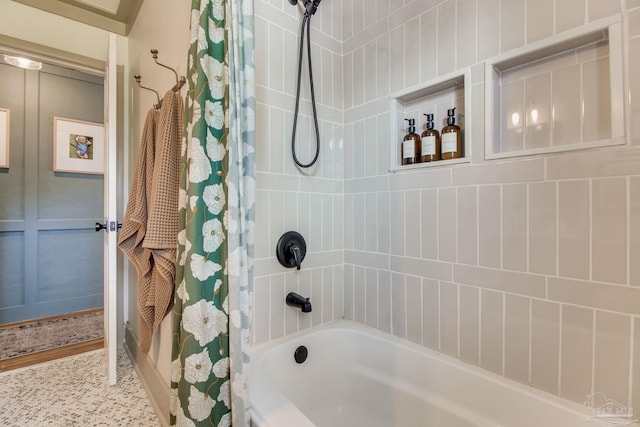 bathroom featuring shower / bath combination with curtain