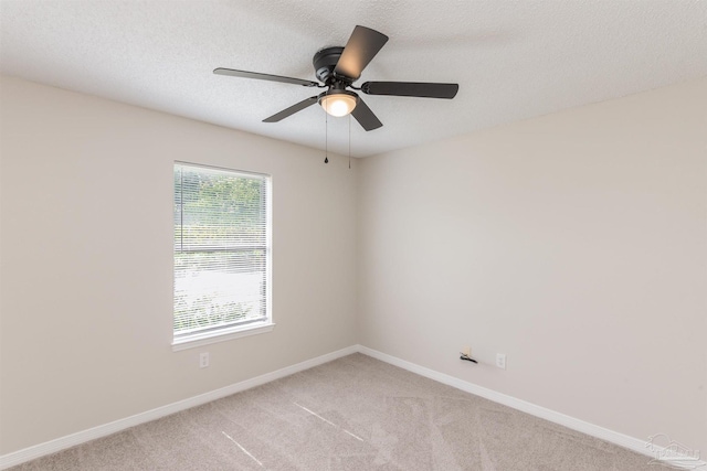10104 Clearsound Dr, Pensacola, FL 32506 - unfurnished room featuring light colored carpet, ceiling fan, baseboards, and a textured ceiling