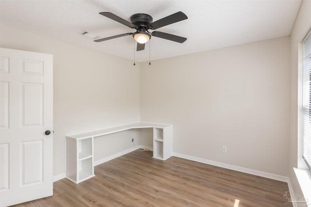 10104 Clearsound Dr, Pensacola, FL 32506 - interior space with ceiling fan, baseboards, visible vents, and light wood finished floors