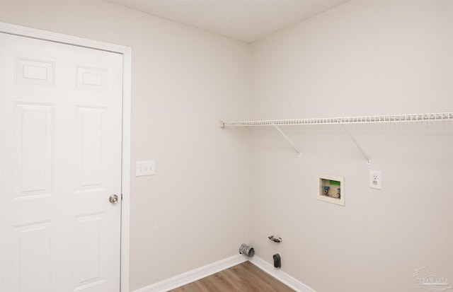 10104 Clearsound Dr, Pensacola, FL 32506 - clothes washing area with light wood-style flooring, baseboards, gas dryer hookup, laundry area, and washer hookup