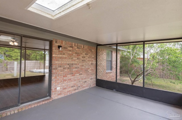 10104 Clearsound Dr, Pensacola, FL 32506 - unfurnished sunroom with a wealth of natural light and a skylight