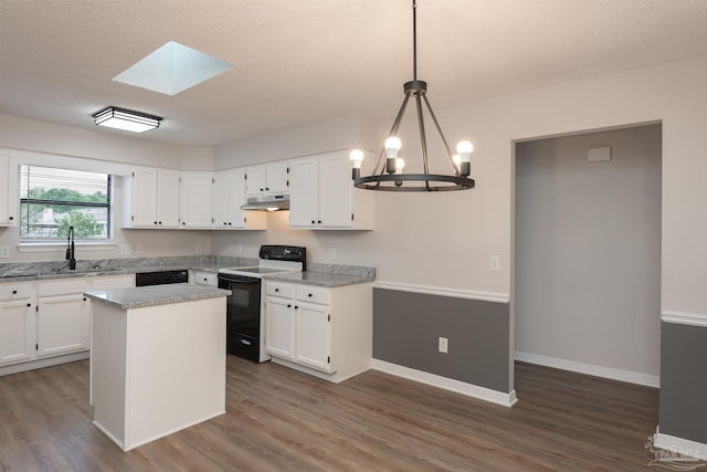 10104 Clearsound Dr, Pensacola, FL 32506 - kitchen featuring wood finished floors, electric range, and under cabinet range hood
